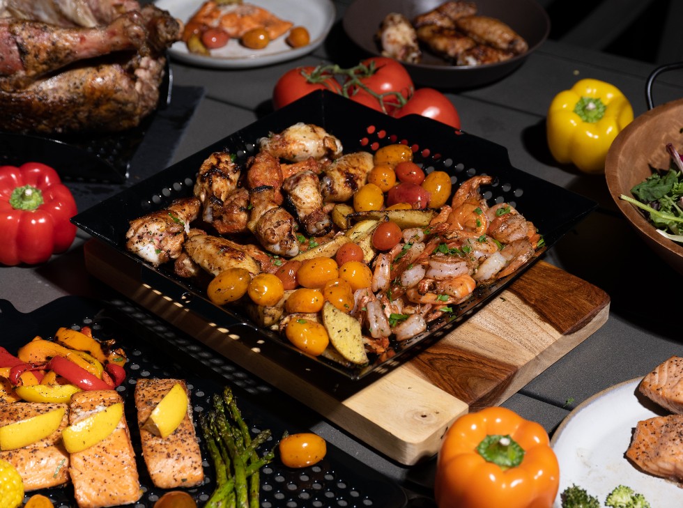 Oscarware®12” Porcelain Coated Wok Topper from the grill to the table.