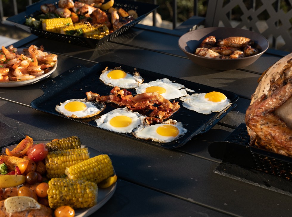 Oscarware® Porcelain Coated Griddle Topper from the grill to the table.