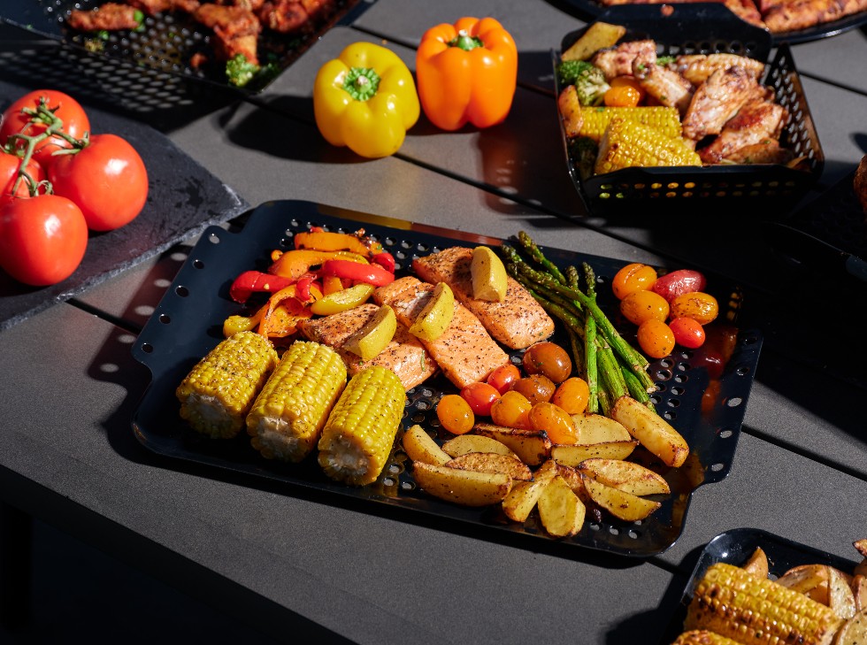 Oscarware® 16” x 12” Porcelain Coated Grill Topper from the grill to the table.