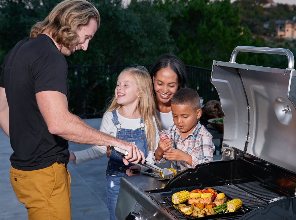 16” x 12” Porcelain Coated Grill Topper prevents food from falling into grill.