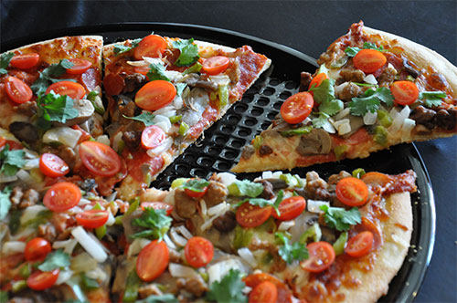 Oscarware® Introduced pizza on the grill and the product to grill pizza.