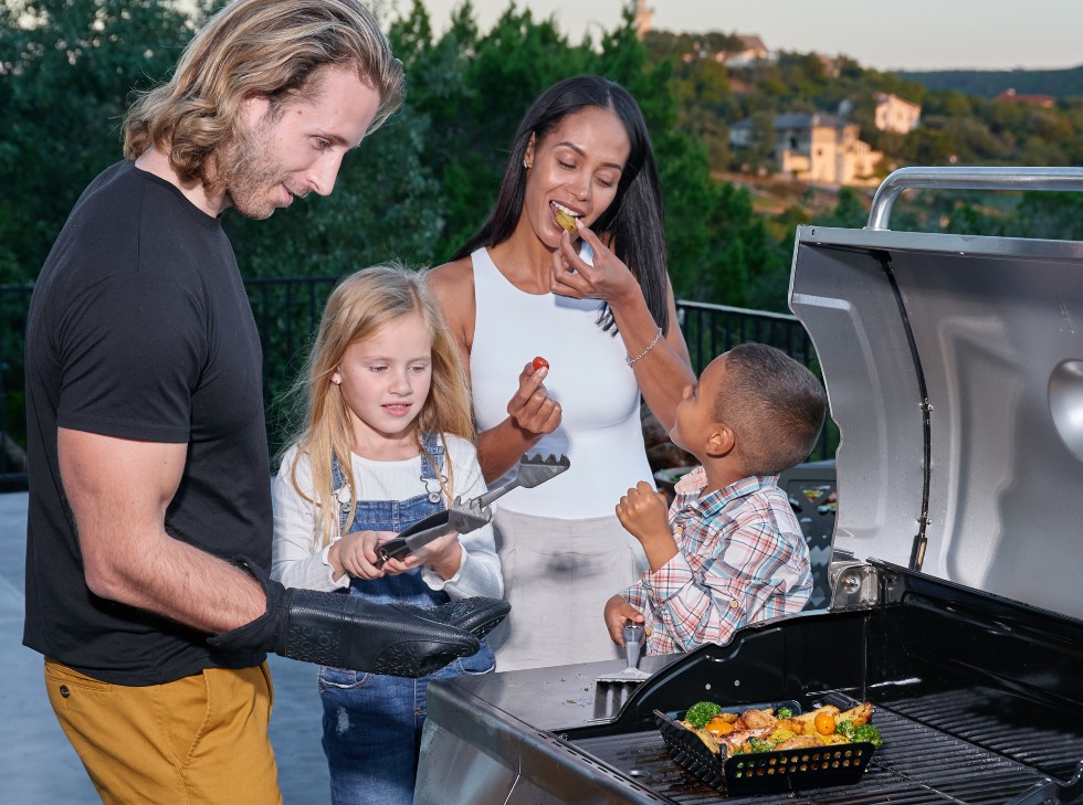 Oscarware® 7” Porcelain Coated Mini Wok Topper prevents food from falling into grill.