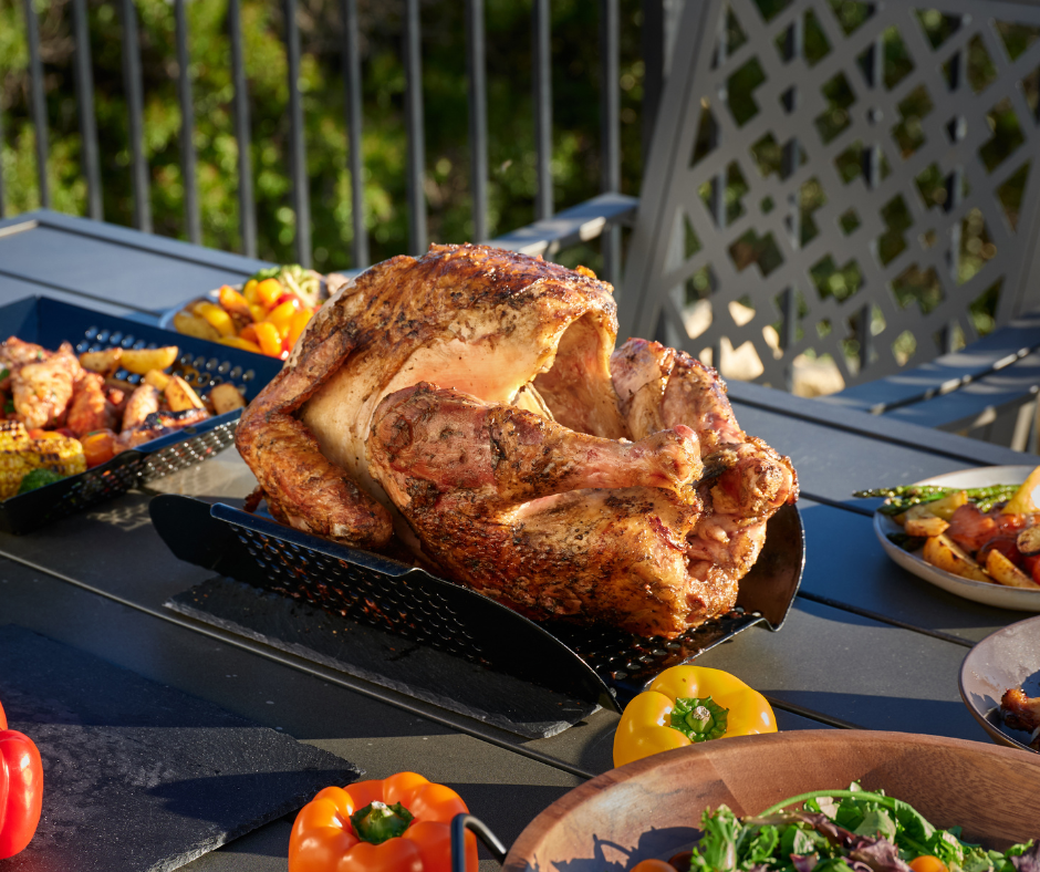 Smoke Grilled Turkey Perfect For Your Thanksgiving Dinner 8 Large grilled turkey with the Oscarware XL Rib and Roast Rack