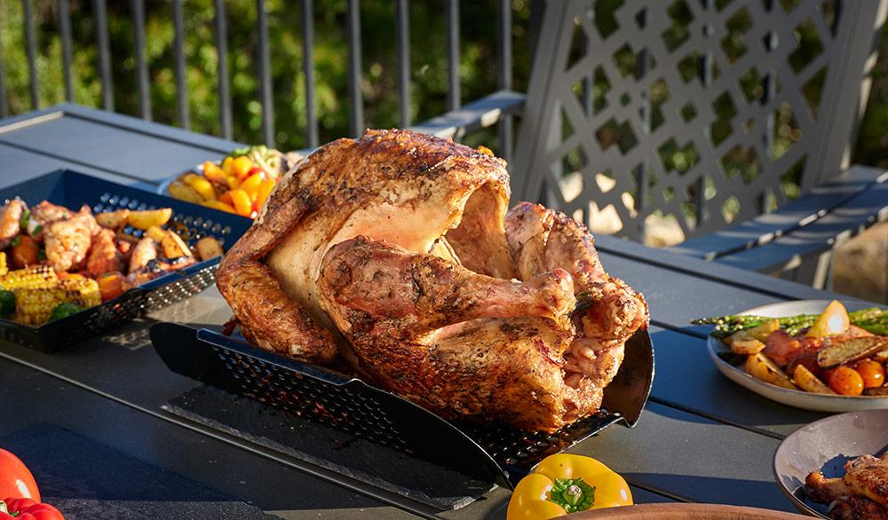 Grilled Herb Butter Turkey. Cooked on the Grill using Oscarware® Porcelain Coated XL Roast and Rib Rack.